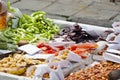 Assorted dried fruits and candied nuts on stall at street market