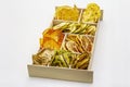 Assorted dried fruits. Healthy eating concept. Wooden box, isolated on a white background Royalty Free Stock Photo