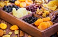 Assorted dried fruits in wooden box Royalty Free Stock Photo