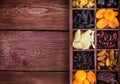 Assorted dried fruits in wooden box Royalty Free Stock Photo