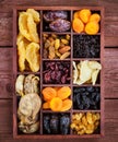 Assorted dried fruits in wooden box Royalty Free Stock Photo