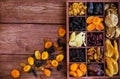 Assorted dried fruits in wooden box Royalty Free Stock Photo