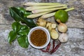 Assorted dried ground spices in individual bowls with fresh ingredients Royalty Free Stock Photo