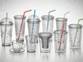 Assorted drinking glasses and cups with colorful straws on a white surface Royalty Free Stock Photo