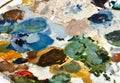 Assorted dry colors on a painters palette Royalty Free Stock Photo