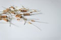 Assorted electronic resistors scattered on white background Royalty Free Stock Photo