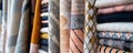 Assorted fabric rolls displayed in a textile shop