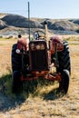 Assorted farming equipment in a field. Big Valley alberta Canada Royalty Free Stock Photo