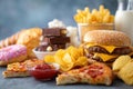 Assorted fast food selection with burgers and fries Royalty Free Stock Photo
