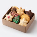 Assorted festive cookies in box with snowflake and tree decorations Royalty Free Stock Photo