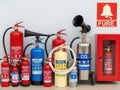 Assorted fire extinguishers and safety equipment Royalty Free Stock Photo