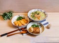 Assorted food Fried Chicken Cutlet, Fried Tofu, Braised Egg, Squid Soup served in dish isolated on table top view of taiwan food