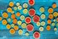Citrus fruits orange, lemon, grapefruit, mandarin, lime on blue background Royalty Free Stock Photo