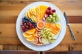 assorted fresh fruit slices arranged on a platter Royalty Free Stock Photo