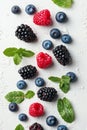 Assorted fresh summer berries with mint