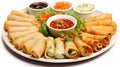 Three flavors of fried spring rolls with three recipes of dipping sauces.AI Generated