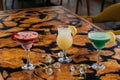 Assorted fruit juice of apple, strawberry, watermelon, passion fruit, mango, orange served in glass isolated on table side view of Royalty Free Stock Photo