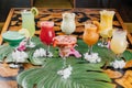 Assorted fruit juice of apple, strawberry, watermelon, passion fruit, mango, orange served in glass isolated on table side view of Royalty Free Stock Photo