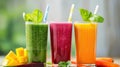 Assorted fruit smoothies with fresh garnishes Royalty Free Stock Photo