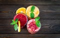 Assorted fruit smoothies on a wooden table Royalty Free Stock Photo