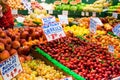 Assorted fruit stand, indoor market Royalty Free Stock Photo