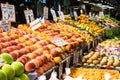 Assorted fruit stand, indoor market Royalty Free Stock Photo