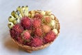 Assorted fruites on bamboo basket banana, lychee, rambutan and  longkong fruit health food. or a gift basket for important Royalty Free Stock Photo