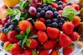 assorted fruits and berries on a plate. delicious and healthy vegetarian dessert Royalty Free Stock Photo