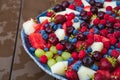 assorted fruits and berries on a plate. summer harvest. Royalty Free Stock Photo