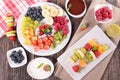 Assorted fruits and dip Royalty Free Stock Photo