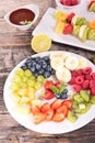 Assorted fruits and dip Royalty Free Stock Photo