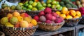 Assorted Fruits Displayed in Overflowing Baskets Royalty Free Stock Photo