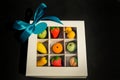 Assorted fruits shaped candy made from sugar marzipan in white gift box Royalty Free Stock Photo