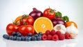 Assorted fruits and vegetables on a white surface Royalty Free Stock Photo