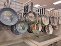 Assorted frying pans and kitchen cookware displayed on Marshalls store shelf Royalty Free Stock Photo