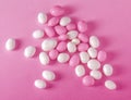 Pink and white candy dragees.