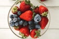 Mixed berries in glass bowls closeup, top view Royalty Free Stock Photo
