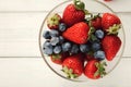 Mixed berries in glass bowls closeup, top view Royalty Free Stock Photo