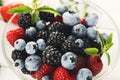 Mixed berries in glass bowls closeup Royalty Free Stock Photo