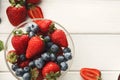 Mixed berries in glass bowls closeup, top view Royalty Free Stock Photo