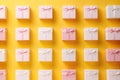 Assorted Gift Boxes on Yellow Background. Generative AI Royalty Free Stock Photo