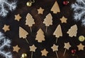 Assorted gingerbread cookies with Christmas balls and snowflakes