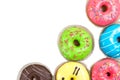 Assorted glazed doughnuts in different colors Royalty Free Stock Photo