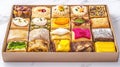 Assorted gourmet dessert squares gift box on marble Royalty Free Stock Photo
