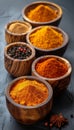 Assorted gourmet spices and seasonings displayed in rustic wooden bowls on dark background