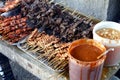 Assorted grilled pork innards such as intestine, liver, gizzard and blood in barbecue sticks