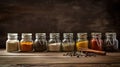 Assorted ground spices in bottles on wooden background. Royalty Free Stock Photo