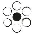 Assorted grunge circle set. Various brush stroke borders. Black ink Vector textures. Creative stamp designs. Royalty Free Stock Photo