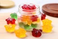 assorted gummy vitamins in a clear jar with a white lid Royalty Free Stock Photo