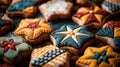 Assorted hand-decorated starfish and flower cookies on a wooden surface